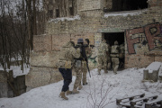 Ukrainian civilians participate in military training organized by an association in a disused complex in Kyiv, January 15, 2023.