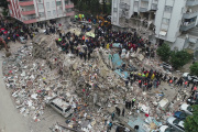 People search through rubble following an earthquake in Adana, Turkey, February 6, 2023.