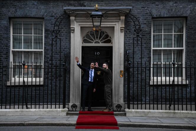 Ukrainian President Volodymyr Zelensky, right, greets British Prime Minister Rishi Sunak upon his arrival at 10 Downing Street in central London on February 8, 2023.