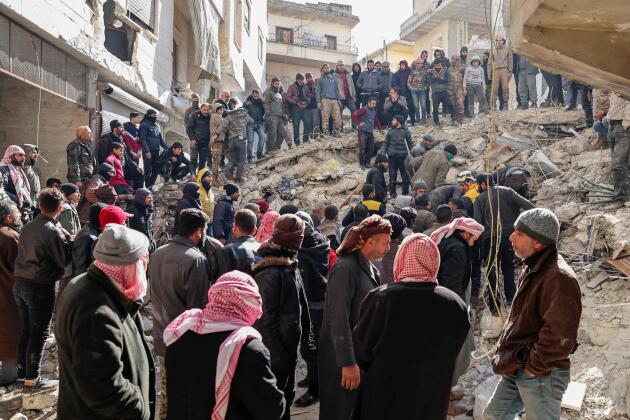 Rescue workers search for victims and survivors in Salqin, Idlib province of Syria, following the February 6 earthquakes. February 7, 2023.