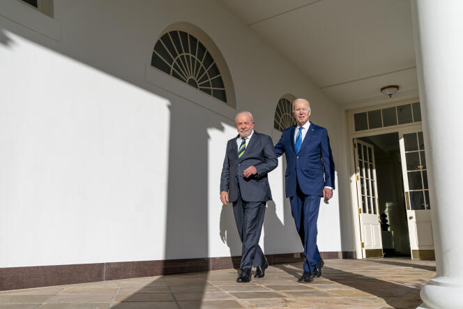 President Joe Biden, right, walks with Brazil's President Luiz Inacio Lula da Silva on the Colonnade to the Oval Office at the White House on February 10, 2023, in Washington.