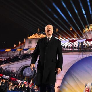 US President Joe Biden walks on stage upon arrival to deliver a speech at the Royal Warsaw Castle Gardens in Warsaw on February 21, 2023.   (Photo by Mandel NGAN / AFP)
