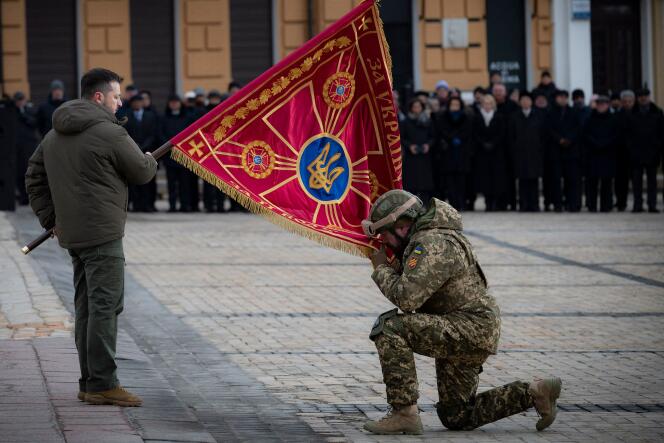 On February 24, 2023, the first anniversary of the Russian invasion, Ukrainian President Volodymyr Zelensky presented a flag to a soldier in Hagia Sophia Square. 