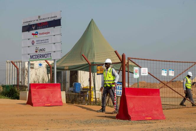 Guards work at TotalEnergies' central processing facility construction in Buliisa, Uganda, on February 20, 2023.