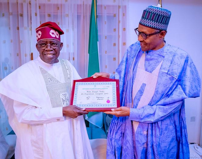 Nigerian President Muhammadu Buhari and Nigeria's newly declared winner of 2023 presidential election, Bola Tinubu poses for a photograph in Daura, Nigeria, March 1, 2023.