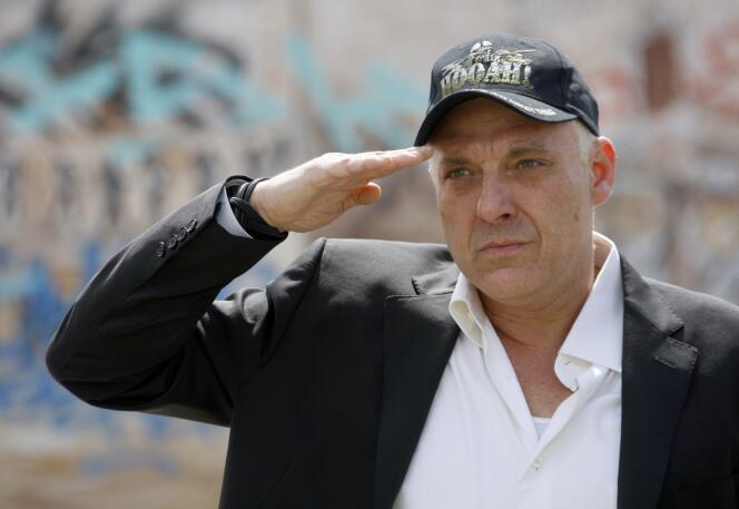 Actor Tom Sizemore salutes in honor of Memorial Day, at the Mexican-American All Wars Memorial in Los Angeles, in May 2011. 