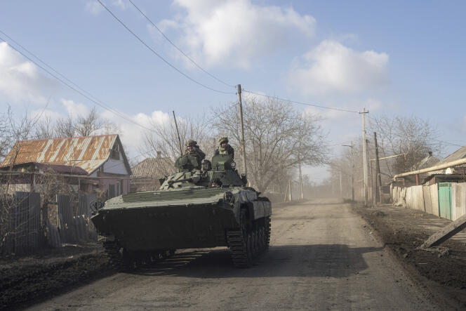 A Ukrainian APC drives towards frontline positions near Bakhmut, Ukraine, Saturday, March 4, 2023.