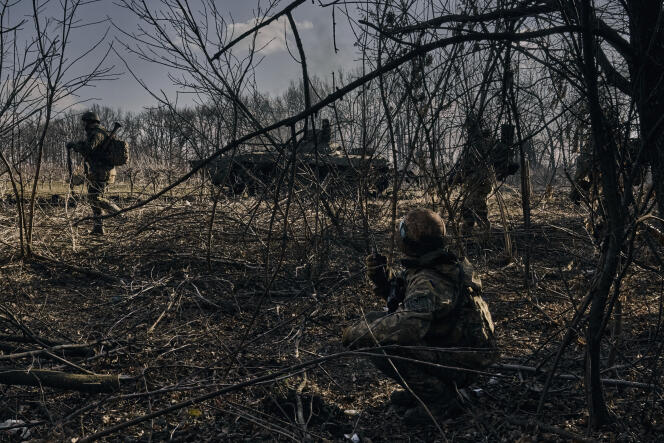 Ukrainian soldiers take position at the frontline close to Bakhmut, Donetsk region, Ukraine, Sunday, March 5, 2023. 