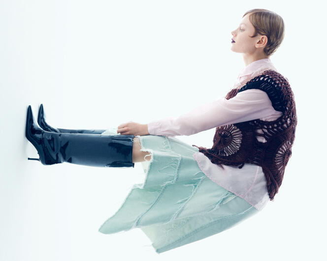 Denim skirt, cotton crochet sweater and silk shirt, Dries Van Noten.  Patent leather heeled boots, Acne Studios.