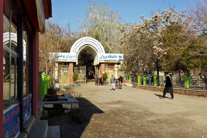 Young men arriving at Parwam University in Charikar, Afghanistan, on the return to classes on March 6, 2023.