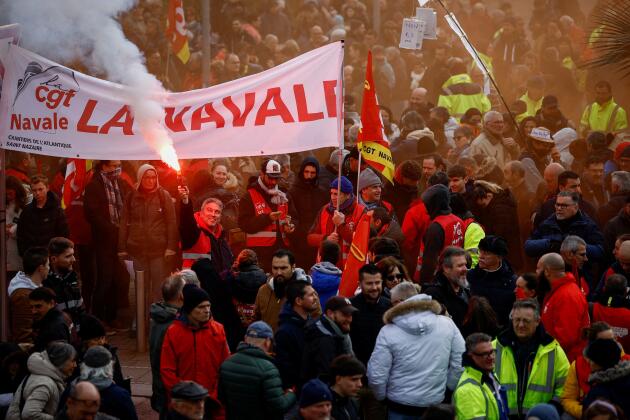 TotalEnergies workers attend a demonstration against the pension reform plan in Saint-Nazaire, March 7, 2023.