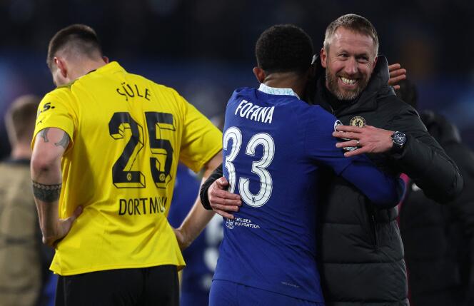 Dortmund's German defender Niklas Sule (L) reacts as Chelsea's English head coach Graham Potter (R) celebrates with Chelsea's French defender Wesley Fofana after the UEFA Champions League round of 16 second-leg football match between Chelsea and Borrusia Dortmund at Stamford Bridge in London on March 7, 2023.