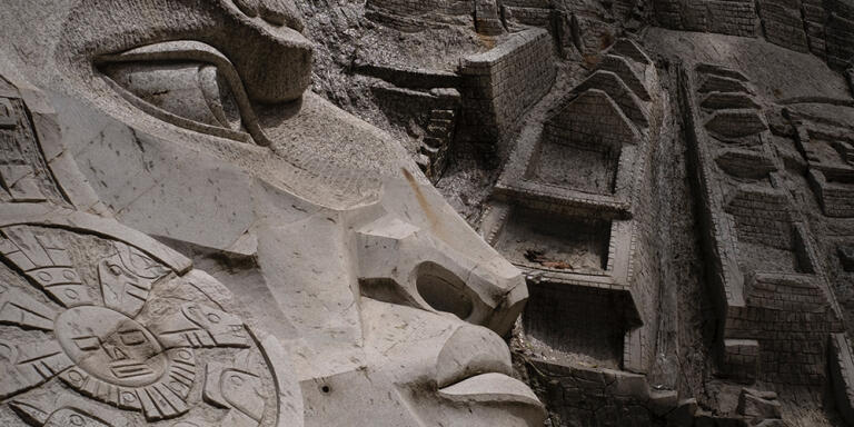 A modern-day carving representing an Inca manand the citadel of Machu Picchu, outside thethermal baths in Aguascalientes. Aguascalientes,Machu Picchu, Peru. 23 February 2023.