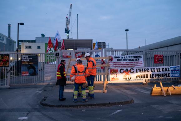 Strikers in front of the picket aimed at blocking the Ivry incinerator against the pension reform, in Ivry, Tuesday March 7, 2023.