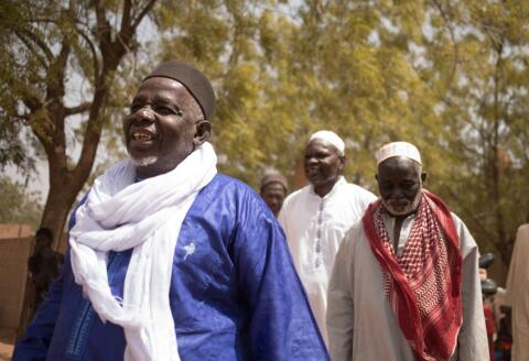 Amadou el-Hadj Yebedie, imam and one of Yambo Ouologuem's only friends, leaves the mosque where Yambo used to pray, in Sevare on March 11, 2022. - Yambo Ouologuem, the first African writer to win the Renaudot prize in 1968, had it withdrawn following accusations of plagiarism. He was educated and grew up in Paris, but left the French capital after being reviled by the authors of negritude on the one hand and the Parisians on the other. He took refuge in Mopti, Sevaré to live a life of faith, taking refuge in the Koran, denying his past as an author and refusing anything that might have to do with France. Considered crazy by the inhabitants, Yambo left little trace in the town. (Photo by FLORENT VERGNES / AFP)