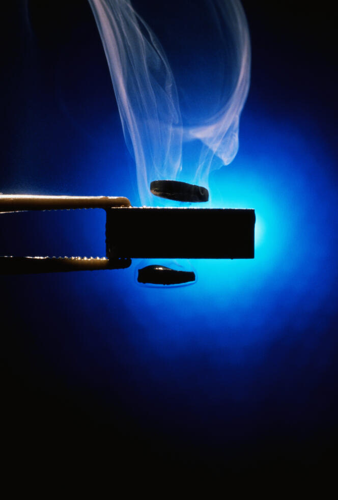 A cooled superconductor creates magnetic levitation, as well as steam, due to its low temperature.