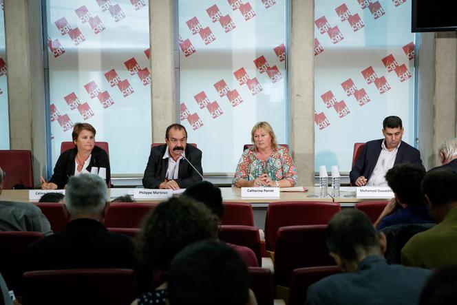 Céline Verzeletti on the left of Philippe Martinez during a press conference, August 31, 2016. 