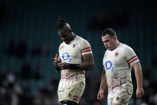 Maro Itoje and team mate Jamie George at the end of the Six Nations match between England and France at Twickenham Stadium on March 11.