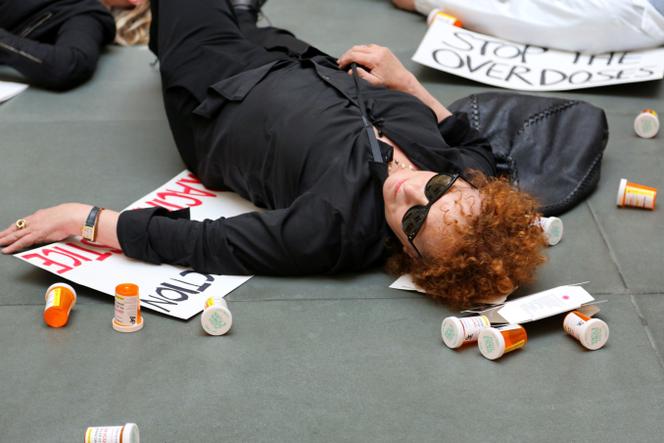 Photographer Nan Goldin at a protest outside the Harvard Art Museums in Cambridge, Massachusetts in 2018, in Laura Poitras' documentary 