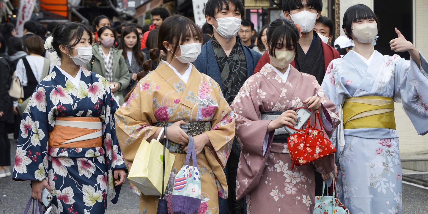 Masks stay put in Japan despite government guidelines being lifted