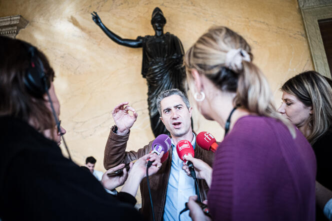 La France Insoumise (left) MP Francois Ruffin speaks to journalists in Paris on March 16, 2023.