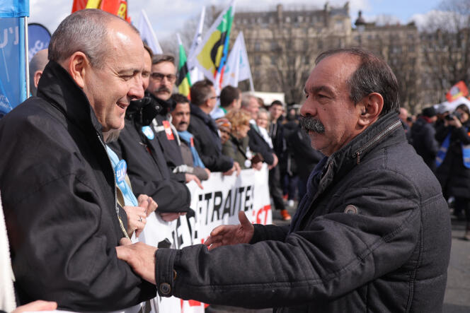 Laurent Berger, secretary general of the CFDT, and Philippe Martinez, secretary general of the CGT, during the demonstration against the pension reform, Wednesday March 15, 2023, in Paris. 