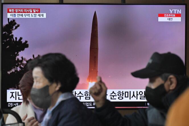 A television in a train station in Seoul shows the launch of a North Korean missile on March 16, 2023.