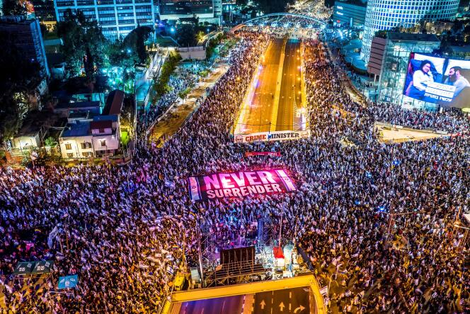 An aerial view shows people protesting as Israeli Prime Minister Benjamin Netanyahu's nationalist coalition government presses on with its contentious judicial overhaul, in Tel Aviv, Israel, March 18, 2023.