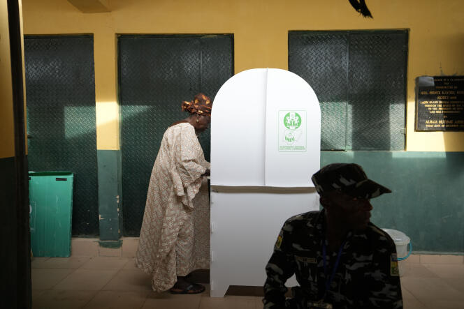 A woman votes for Governor of Lagos State on Saturday, March 18.