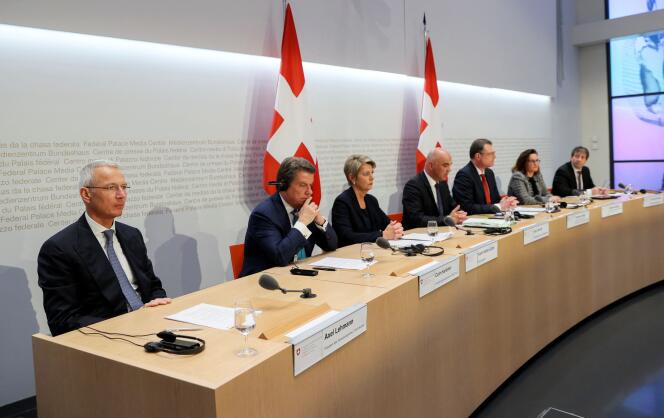Swiss Federal President Alain Berset, members of the Swiss government, and leaders of UBS and Credit Suisse attend a news conference on Credit Suisse after UBS takeover offer, in Bern, Switzerland, March 19, 2023.