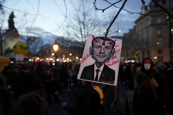 A diverted portrait of French President Emmanuel Macron, during a demonstration against pension reform, Place de la République in Paris, March 21, 2023.