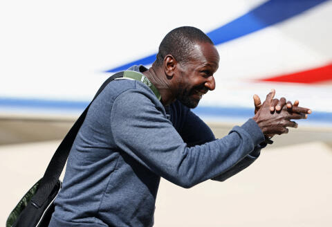 Freed French hostage journalist Olivier Dubois, who was held hostage in Mali for nearly two years by the Support Group for Islam and Muslims (GSIM), reacts as he arrives at the Villacoublay airport, in Velizy-Villacoublay, near Paris, on March 21, 2023. - French journalist Olivier Dubois was released on March 20, 2023. (Photo by YVES HERMAN / POOL / AFP)