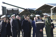 President Emmanuel Macron in front of a French-made Caesar howitzer at the Mont-de-Marsan air base, in southwestern France, on January 20, 2023.