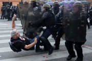 French riot police clash with protestors during a demonstration in Toulouse, southwestern France, on March 23, 2023.