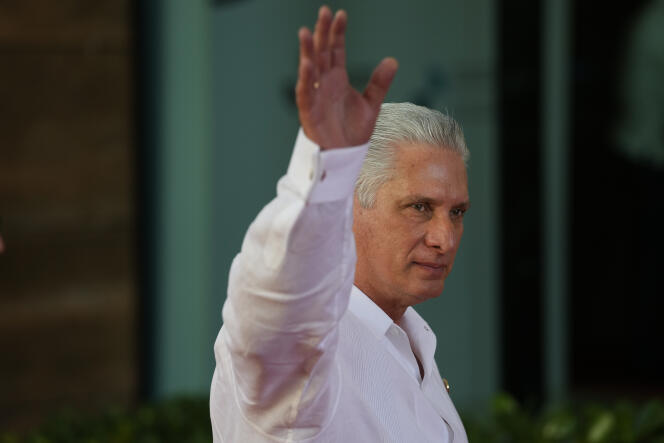 Cuba's President Miguel Diaz-Canel, greets upon his arrival for the session for the 28th Ibero-American Summit, in Santo Domingo, Dominican Republic, Saturday, March 25, 2022. (AP Photo/Ariana Cubillos)