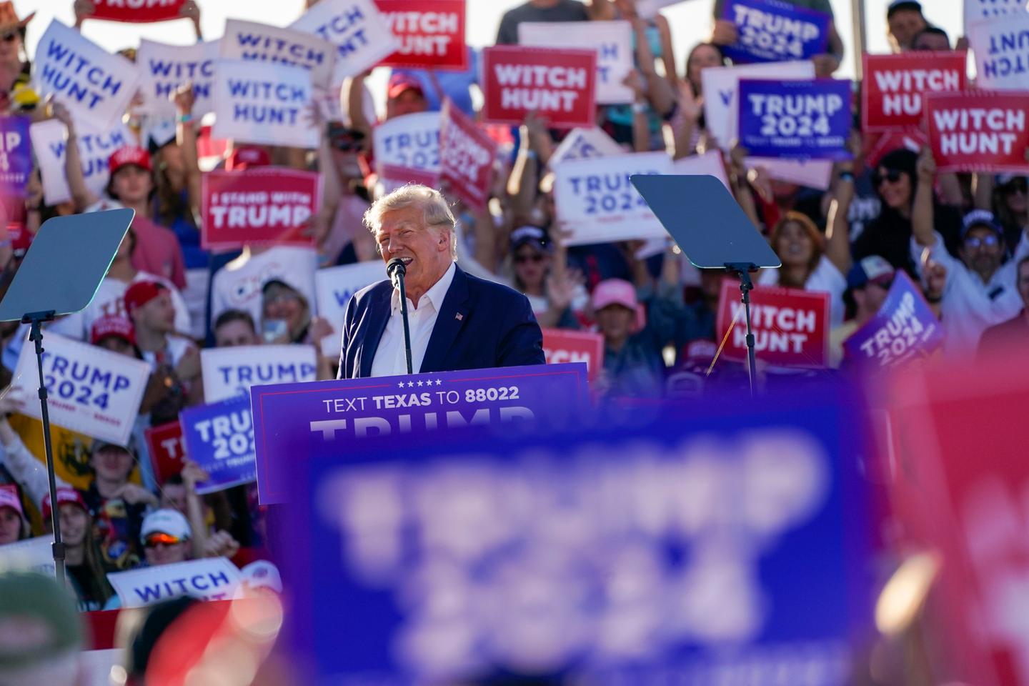 at a meeting in Texas, Donald Trump denies “any crime” on his part
