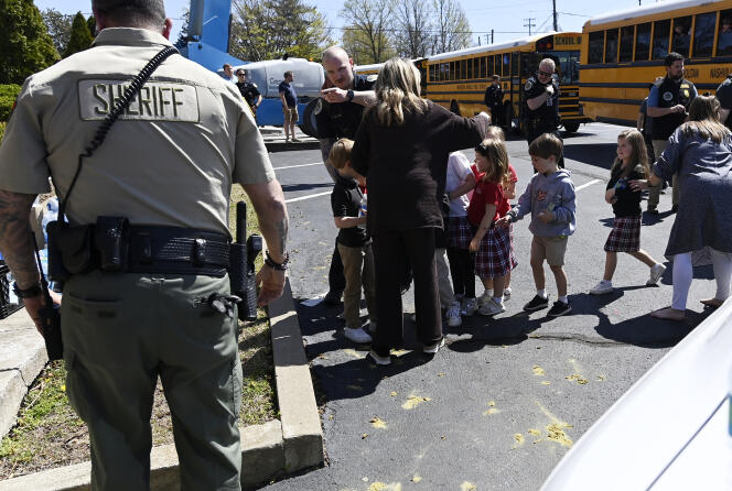 Covenant School students reunite with their parents as they get off the bus at the Woodmont Baptist Church site after the mass shooting that hit their school and left 6 dead in Nashville, Tennessee, USA. United, March 27, 2023.