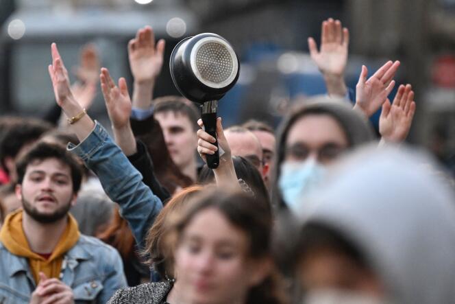 Demonstrators take part in a pot concert to protest during French President Emmanuel Macron's televised address to the nation, in Rennes, April 17, 2023.