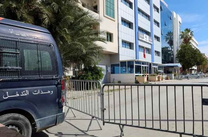 A police vehicle is parked near the building of Ennahda party headquarters, after police raided the headquarters early on Tuesday and evacuated all present to start a search that will take days, after showing a judicial warrant, party officials said, in Tunis, Tunisia April 18 , 2023. 