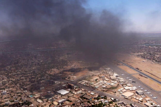Smoke rising over Khartoum International Airport on April 20, 2023.