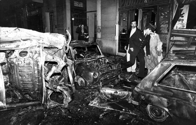 Destroyed vehicles and damabe on the building are seen at the scene after the bombing of the Copernic street synagogue in Paris, October 3, 1980. 