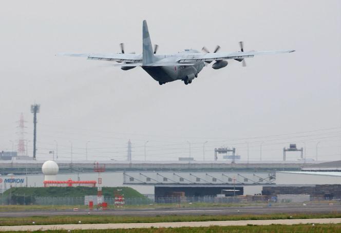 A Japan Air Self-Defense Force C-130 transport plane takes off for Djibouti in preparation for the evacuation of Japanese nationals from Sudan, at the Komaki Air Base in Aichi prefecture on April 21, 2023. 