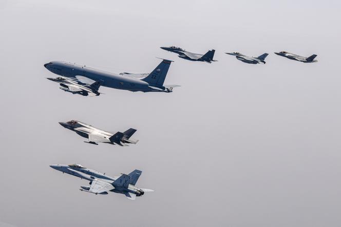 US FA-18, F-35B, F-16 fighter jets, KC-135 tanker, South Korean Air Force F-15K, KF-16 and F-35A fighter jets fly over the Korean Peninsula during a joint air drill in South Korea on Friday, April 21, 2023.