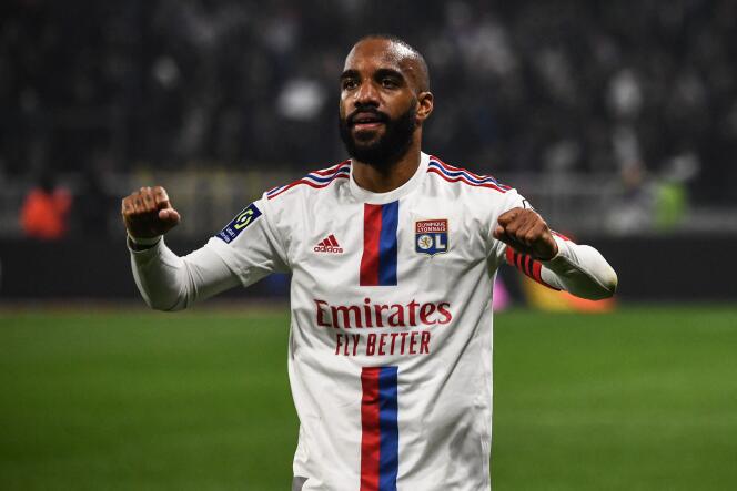 Lyon's French forward Alexandre Lacazette celebrates scoring his team's first goal during the French L1 football match between Olympique Lyonnais (OL) and Olympique Marseille (OM) at Groupama Stadium in Decines-Charpieu, central-eastern France on April 23, 2023.