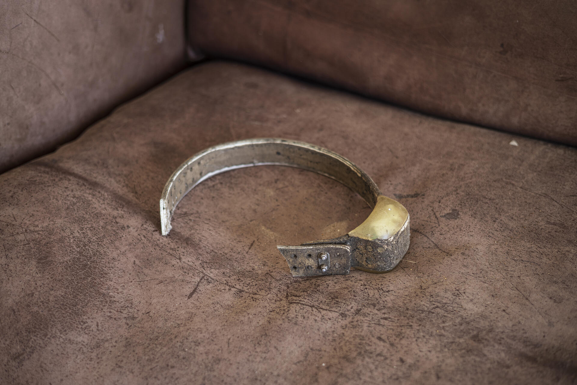 The anklet of a rhino killed by poachers the previous week, on a couch at the anti-poaching unit headquarters in Lalibela reserve outside Makhanda on April 7, 2023.