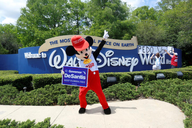 A supporter of Governor Ron DeSantis shows his support for Florida's Republican-backed 'Don't Say Gay' bill, which would ban classroom teaching about sexual orientation and gender identity to many young people, outside Walt Disney World in Orlando, Florida on April 16.  , 2022.