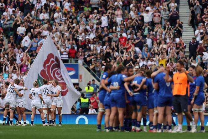 England's teammates celebrate after winning the Six Nations international women's rugby union match between England and France at Twickenham in south-west London on April 29, 2023. England wins 38 - 33 against France.  (Photo by Adrian DENNIS / AFP)