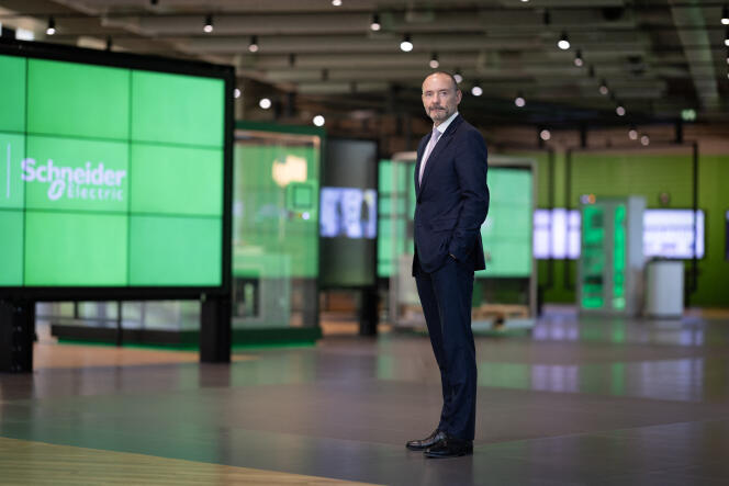 The managing director of French electrical equipment giant Schneider Electric, German Peter Herweck, poses during a photo session at Schneider's headquarters in Rueil-Malmaison, in the Paris region, on May 3, 2023. 