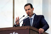 Syria's President Bashar al-Assad addresses the new members of parliament in Damascus, Syria in this handout released by SANA on August 12, 2020. 
