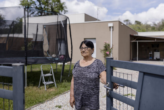 Aline La Fleur in front of her house built on the land previously occupied by her mobile home, in Blanquefort (Gironde), on May 11, 2023. 